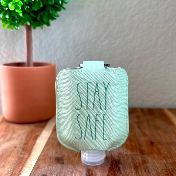 ❗️2/$22❗️ RAE DUNN STAY SAFE HAND SANITIZER HOLDER & BOTTLE HOLIDAY SOCK GIFT - Picture 1 of 5